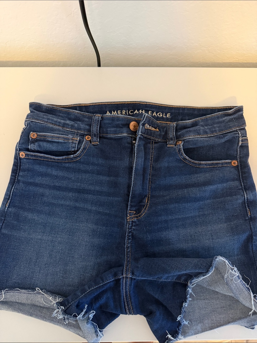 American Eagle navy blue denim shorts